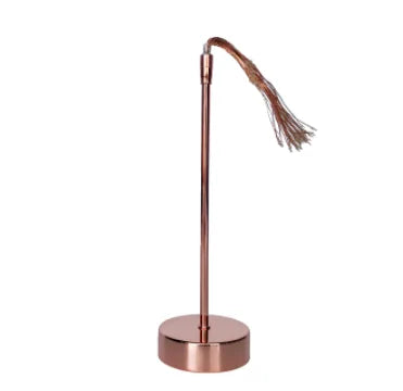 The Backyard Beautician feather lamp delivers high-quality ambient lighting, combining elegance with modern technology. Its remote-control functionality and premium materials ensure durability and style in any home setting.”